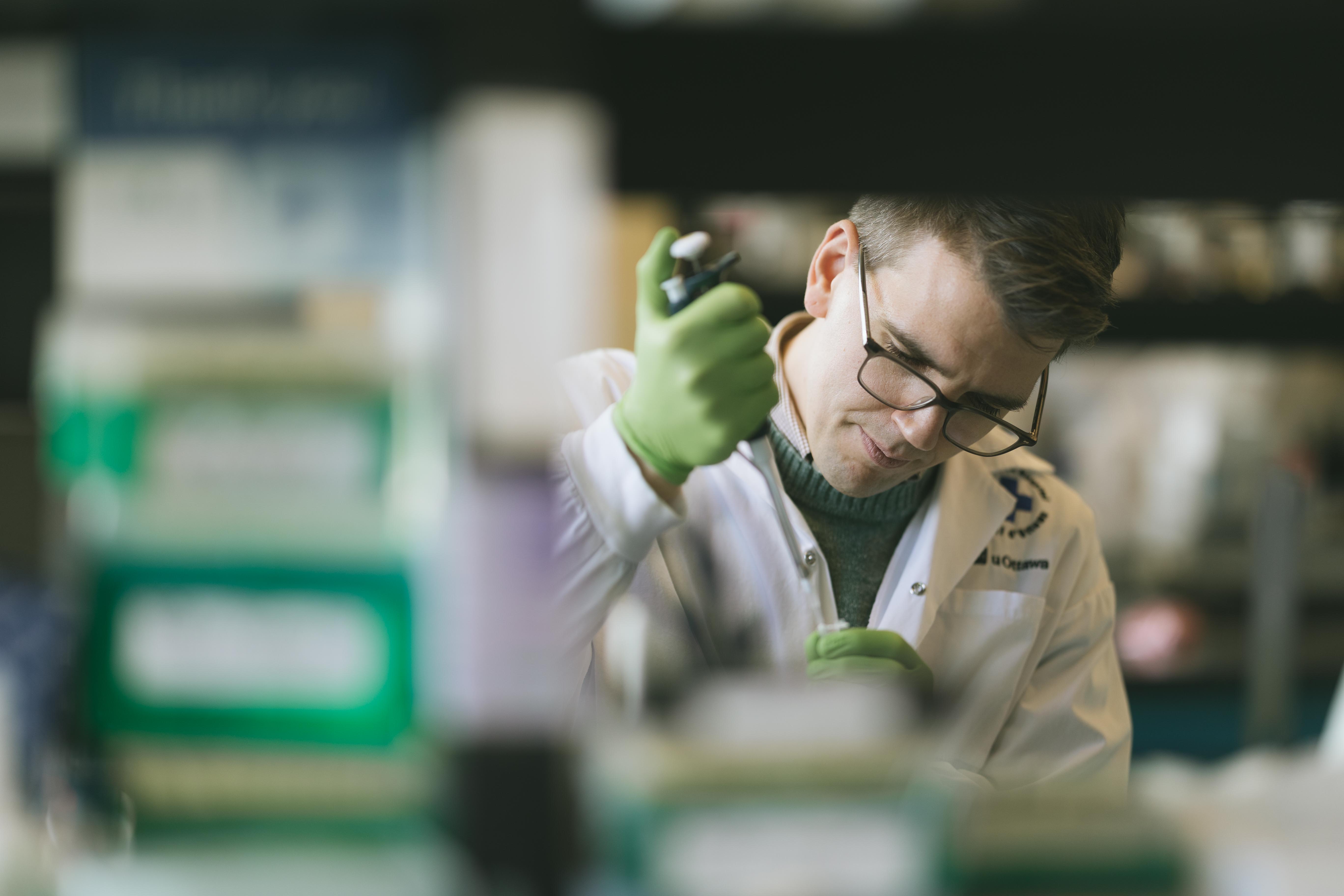 David Cook working in the lab